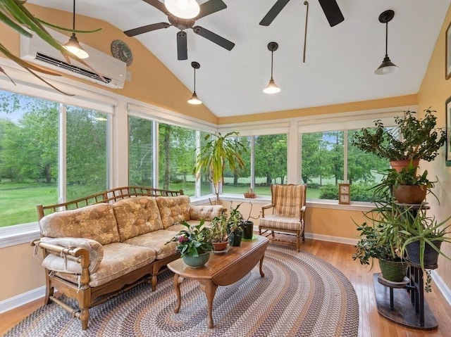 58 Fitzpatrick Rd, Grafton, MA 01519 - sunroom with vaulted ceiling, a wall unit AC, wood finished floors, and baseboards