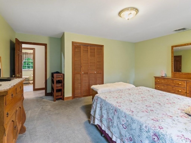 58 Fitzpatrick Rd, Grafton, MA 01519 - bedroom with a closet, light carpet, and baseboards