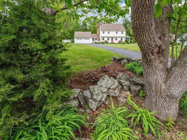 58 Fitzpatrick Rd, Grafton, MA 01519 - view of green lawn featuring asphalt driveway