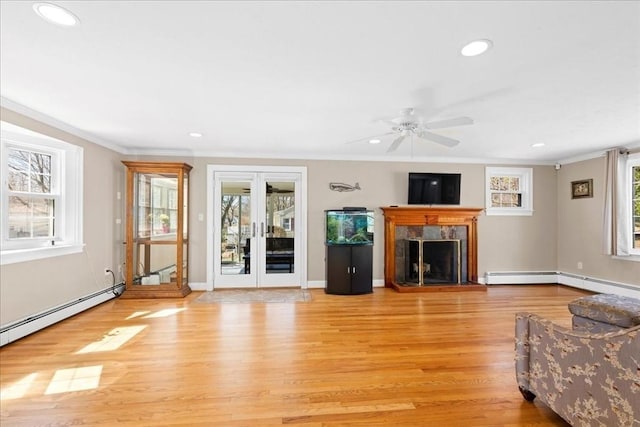 living room with recessed lighting and light wood-type flooring