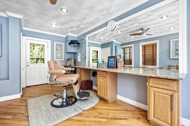 33 S S, Hingham, MA 02043 - kitchen featuring baseboards, ceiling fan, light wood-style flooring, ornamental molding, and light stone countertops