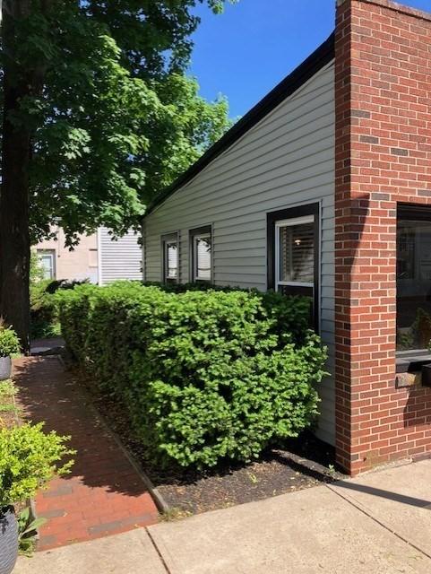 33 S S, Hingham, MA 02043 - view of side of home featuring brick siding