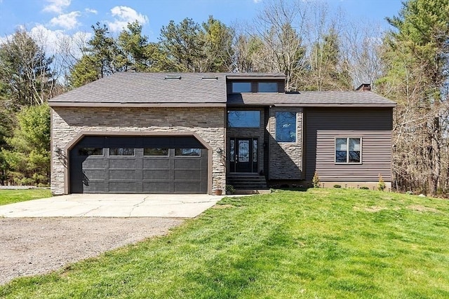 view of front of property with a garage, roof with shingles, a front yard, stone siding, and concrete driveway