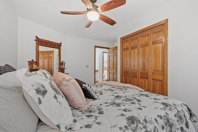 bedroom featuring a closet and a ceiling fan