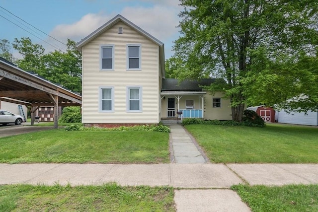 28 River St, Erving, MA 01344 - traditional-style house featuring covered porch and a front lawn