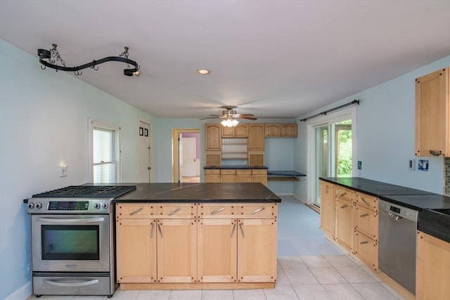 28 River St, Erving, MA 01344 - kitchen featuring stainless steel appliances, light brown cabinetry, ceiling fan, dark countertops, and recessed lighting