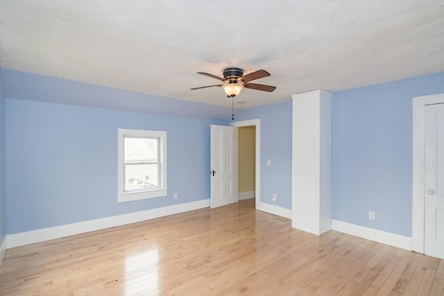 28 River St, Erving, MA 01344 - empty room with ceiling fan, light wood-style floors, and baseboards