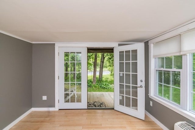 28 River St, Erving, MA 01344 - doorway featuring light wood-style flooring and baseboards