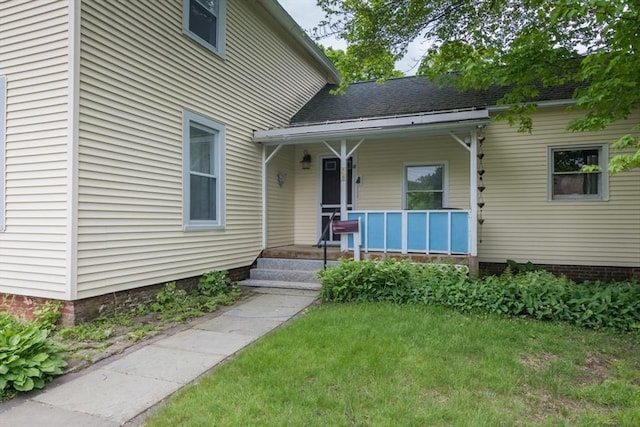 28 River St, Erving, MA 01344 - entrance to property featuring a porch and a lawn
