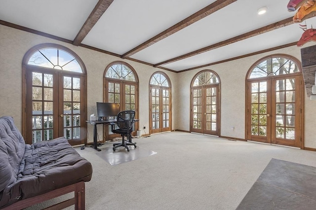 office space featuring carpet, baseboards, beamed ceiling, and french doors