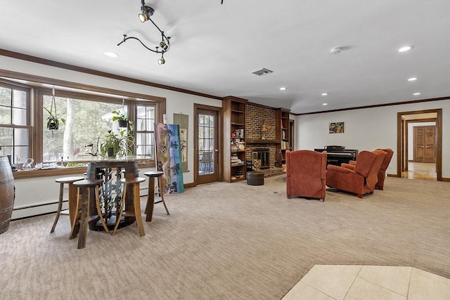 interior space with light colored carpet, a baseboard radiator, ornamental molding, a fireplace, and recessed lighting