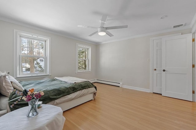 bedroom featuring visible vents, baseboards, a baseboard radiator, light wood-style flooring, and ornamental molding