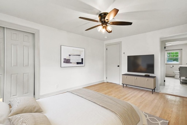 20 Marjorie Rd, Wilmington, MA 01887 - bedroom featuring light wood-type flooring, baseboards, ceiling fan, and connected bathroom