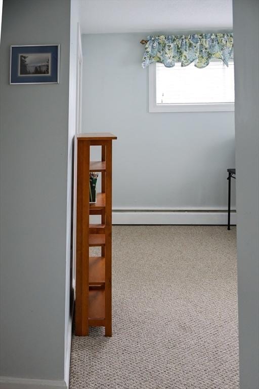 61 Outer Dr Unit 61, Chicopee, MA 01022 - corridor with a baseboard radiator and baseboards