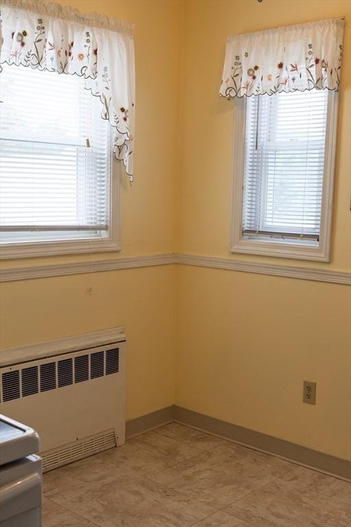 61 Outer Dr Unit 61, Chicopee, MA 01022 - spare room with radiator heating unit and baseboards