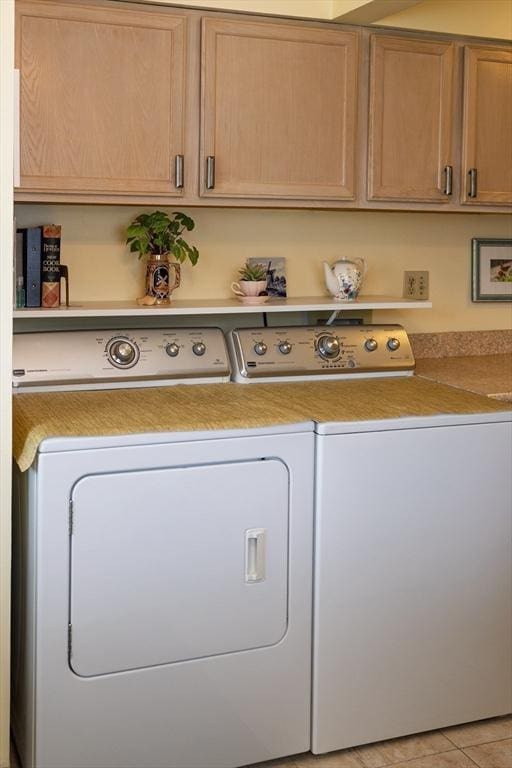61 Outer Dr Unit 61, Chicopee, MA 01022 - washroom with separate washer and dryer and cabinet space