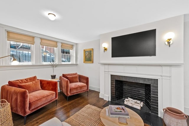 93 Pinckney Unit 1, Boston, MA 02114 - living room with dark wood finished floors, a fireplace, and baseboards