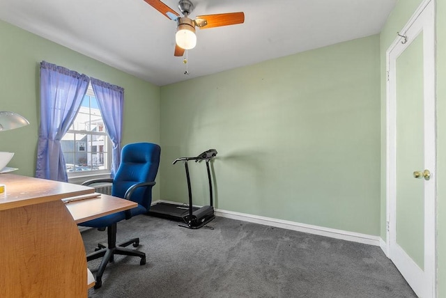 carpeted office with ceiling fan