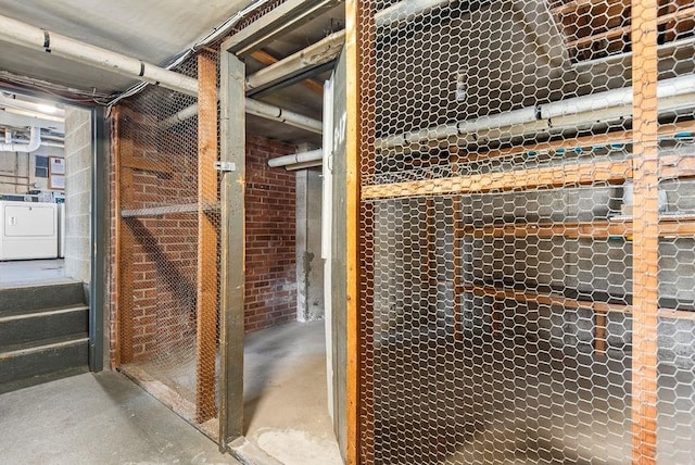 storage room with washer / clothes dryer