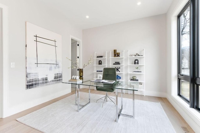 home office with visible vents, recessed lighting, baseboards, and wood finished floors