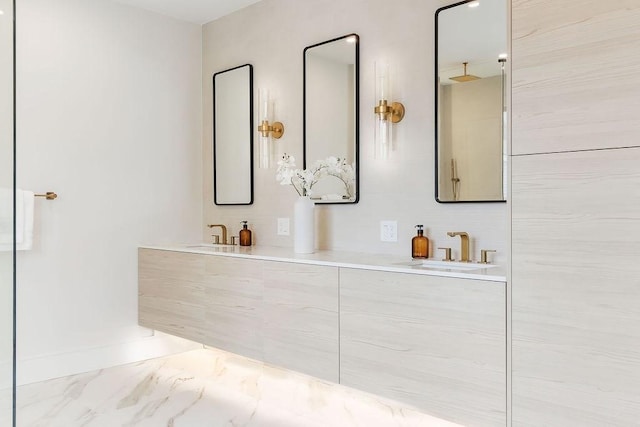 bathroom featuring double vanity and a sink