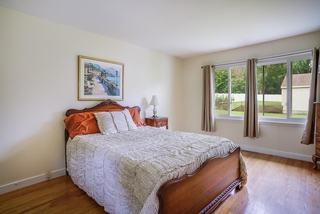 177 Elm St, Andover, MA 01810 - bedroom with baseboards and wood finished floors