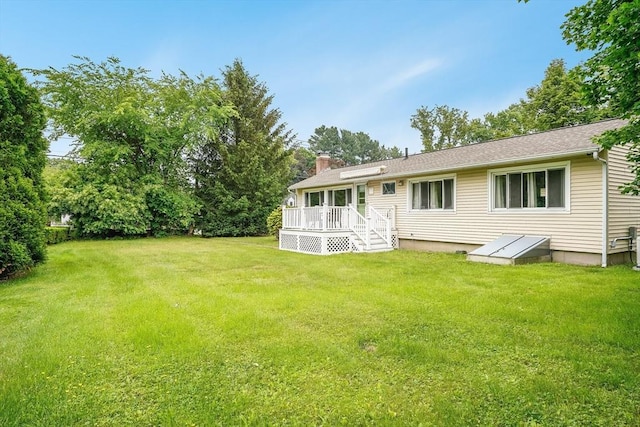 177 Elm St, Andover, MA 01810 - view of green lawn with a wooden deck