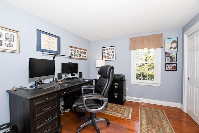 home office featuring dark hardwood / wood-style flooring