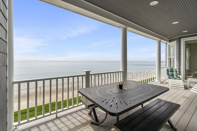 30 Preston Ct Unit 1, Swampscott, MA 01907 - wooden terrace featuring view of water and beach and outdoor dining space