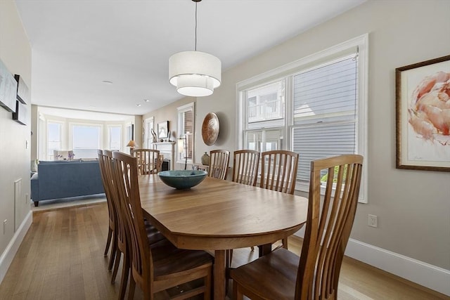 30 Preston Ct Unit 1, Swampscott, MA 01907 - dining room featuring wood finished floors and baseboards