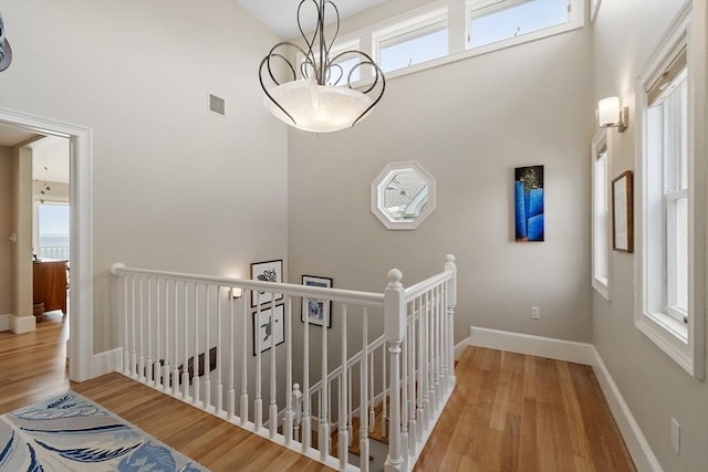 30 Preston Ct Unit 1, Swampscott, MA 01907 - stairway featuring wood finished floors and a towering ceiling