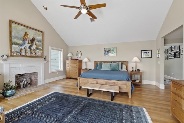 30 Preston Ct Unit 1, Swampscott, MA 01907 - bedroom featuring light wood-style flooring, a premium fireplace, ceiling fan, and high vaulted ceiling
