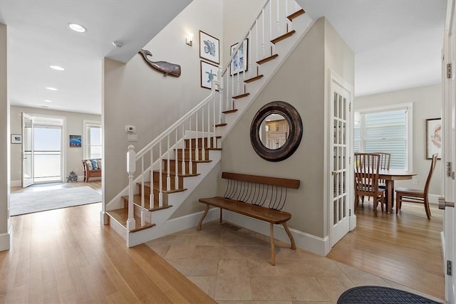 30 Preston Ct Unit 1, Swampscott, MA 01907 - stairway with recessed lighting and tile patterned flooring