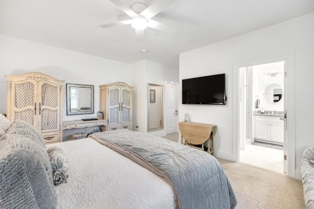 41 Old Main Rd Unit 3A, Falmouth, MA 02556 - bedroom with light carpet, ensuite bath, and ceiling fan