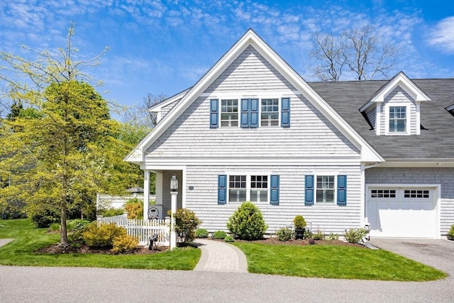 41 Old Main Rd Unit 3A, Falmouth, MA 02556 - view of front of home featuring asphalt driveway, an attached garage, and a shingled roof