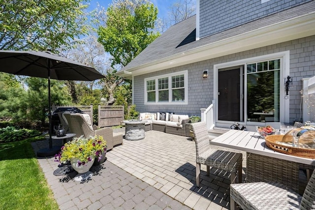 41 Old Main Rd Unit 3A, Falmouth, MA 02556 - view of patio / terrace featuring an outdoor living space, fence, and outdoor dining space