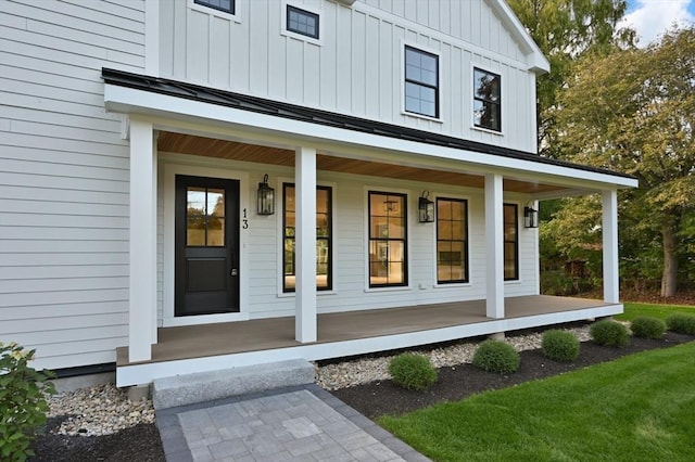 13 Alden Rd, Andover, MA 01810 - property entrance with board and batten siding and covered porch