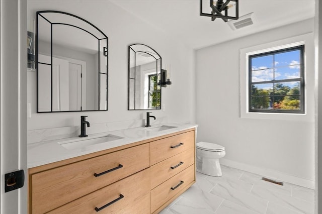 13 Alden Rd, Andover, MA 01810 - full bath featuring a sink, double vanity, and plenty of natural light