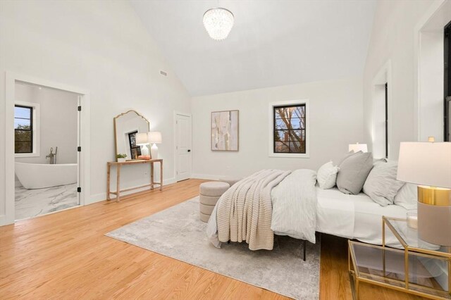 13 Alden Rd, Andover, MA 01810 - bedroom with high vaulted ceiling, wood finished floors, multiple windows, and visible vents