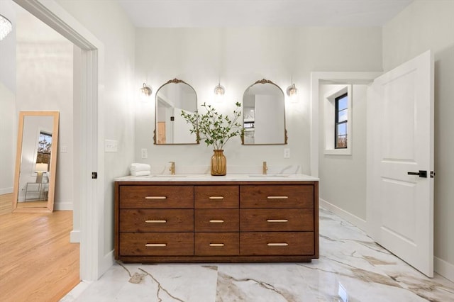 13 Alden Rd, Andover, MA 01810 - full bath featuring double vanity, baseboards, and a sink