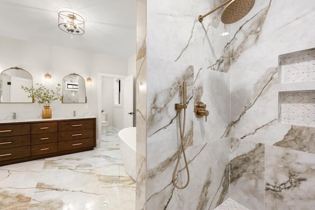 13 Alden Rd, Andover, MA 01810 - full bath with a sink, a marble finish shower, marble finish floor, double vanity, and toilet