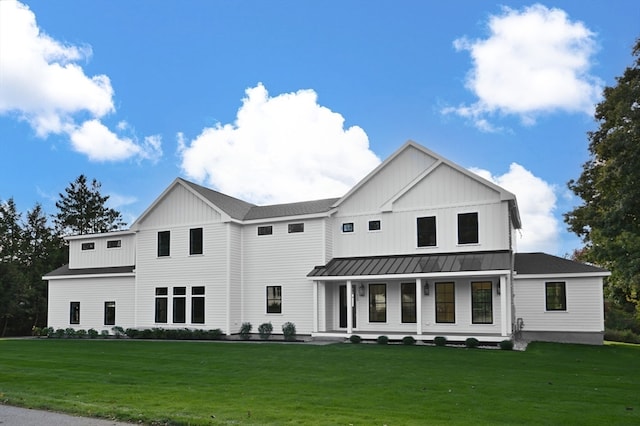 view of front of house featuring a porch and a front lawn