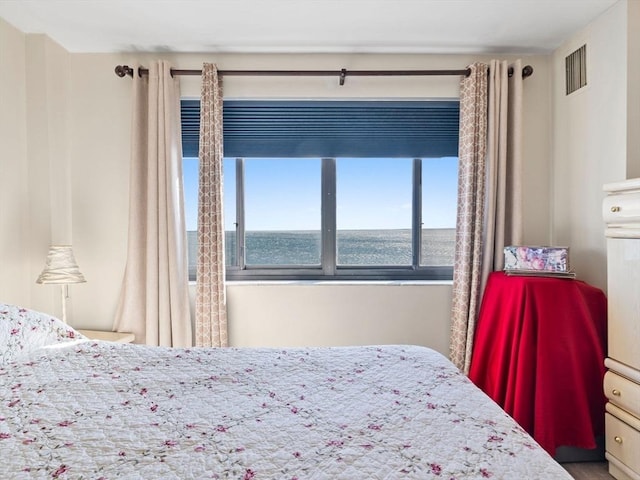 bedroom with a water view