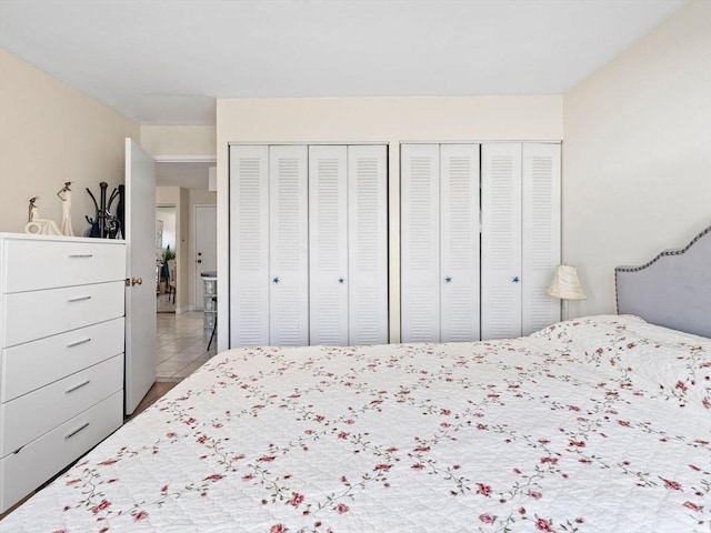 bedroom with two closets