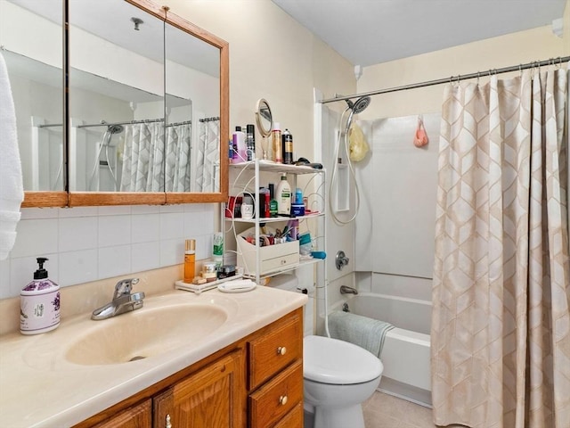 full bathroom with tasteful backsplash, vanity, toilet, and shower / bath combo with shower curtain