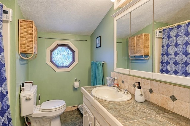 10 Laurel Ln, Bellingham, MA 02019 - bathroom featuring a textured ceiling, vanity, backsplash, tile patterned flooring, and vaulted ceiling
