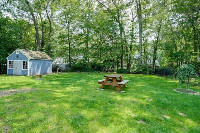 10 Laurel Ln, Bellingham, MA 02019 - view of yard with a storage unit and view of scattered trees