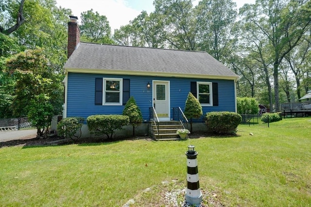 10 Laurel Ln, Bellingham, MA 02019 - view of front of house featuring a chimney, entry steps, and roof with shingles