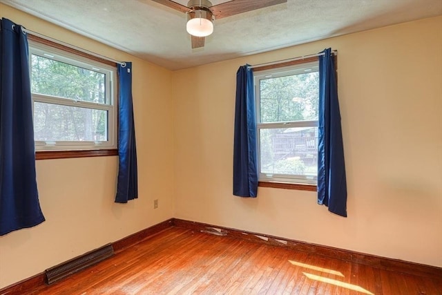 10 Laurel Ln, Bellingham, MA 02019 - spare room with plenty of natural light and hardwood / wood-style flooring