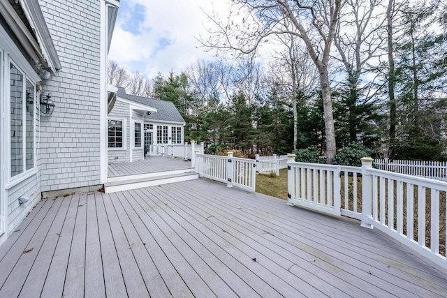 wooden deck featuring fence